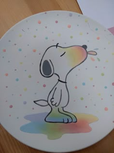 a plate with a drawing of a dog on it