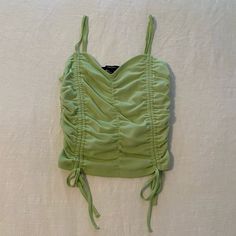 Brand New Light Green Top. Ruched Detail That Cinches Your Body. Ties On The Bottom Are Adjustable As Well As Straps. Ruched Top, Green Top, Green Tops, Forever 21 Tops, Light Green, Forever 21, Womens Tops, Brand New, Green