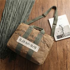 Overview： Design: Green Canvas Military Duffle Bag Pilot Bag Canvas Military Bag Army Style Carrier Bag for MenIn Stock: Ready to Ship (2-4 days)Include: Only BagCustom: NoColor: Army Green, KhakiLeather:, CanvasMeasures: L: 50cm x 33cm x 21cm S: 38cm x 30cm x 14cmWeight: 0.75kgSlots: 1 zipper slot, 1 pad slot, 1 book slot, Accessories(option): NoneStyle: Green Canvas Military Duffle Bag Pilot Bag Canvas Military Bag Army Style Carrier Bag for MenVery durable (At least 5 Years) and it should las Vintage Canvas Bag With Large Capacity For Outdoor, Vintage Large Capacity Canvas Bag For Outdoor, Vintage Canvas Travel Bag For Daily Use, Retro Khaki Travel Bag, Vintage Khaki Bags For Daily Use, Vintage Khaki Satchel For Daily Use, Vintage Khaki Bag With Adjustable Strap, Large Capacity Satchel Briefcase For Outdoor, Vintage Large Capacity Duffle Bag