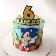 a sonic birthday cake with the number six on it