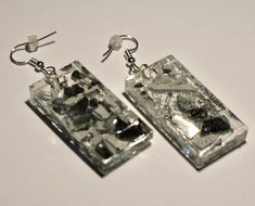 One pair of earrings consisting of imbedded broken pieces of mirror Rectangular Crystal Earrings For Party, Mirror Rectangle, Monogram Earrings, Broken Mirror, Broken Pieces, Bamboo Earrings, Rectangle Earrings, Rectangle Mirror, Jewelry Earrings Dangle