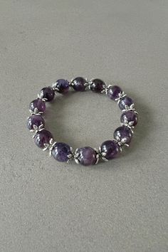 Amethyst bracelet for her amethyst beaded bracelet with natural amethyst gemstone bracelet adjustable amethyst bracelet gift for best friend Expertly crafted, this Handmade Beaded Bracelet showcases the stunning beauty of purple amethyst stones and intricate star-shaped spacers in antique silver color. Each piece is unique and adds a touch of elegance to any outfit. A true statement accessory with natural healing properties, this bracelet is a must-have for any fashion-forward individual. Intere Amethyst 8mm Beads Jewelry Gift, Purple Crystal Bracelet With 8mm Beads As A Gift, Spiritual Amethyst Round Bead Jewelry, Purple Gemstone Beaded Bracelets For Gift, Purple Gemstone Beaded Bracelets As Gift, Spiritual Amethyst Bracelets In Purple, Spiritual Amethyst Purple Bracelets, Spiritual Bracelet Jewelry Gift For Her, Spiritual Bracelet Jewelry As Gift For Her