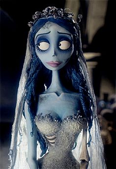 the corpse bride doll is dressed up in her wedding dress and veil with eyes wide open