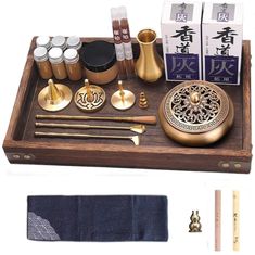 a wooden tray with various items on it