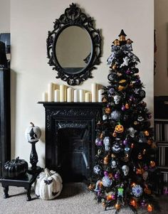 a decorated christmas tree sitting next to a fireplace