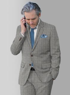 Immerse yourself in the seamless blend of opulence and fashion with our Loro Piana Niccolo Wool Suit. Expertly crafted from pure wool fabric and embellished with a sophisticated plaid pattern, the classy shade of gray not only harmonizes with the distinguished brown base but also introduces a subtle contrast that captures attention without being ostentatious. Whether destined for a wedding, a formal daytime affair, or simply as a refined addition to your personal style, this suit epitomizes sart Green Tweed Suit, Blue Linen Suit, Red Corduroy Jacket, Brown Tweed Suit, Blue Linen Pants, Shade Of Gray, Tweed Sport Coat, Tweed Pants, Herringbone Tweed