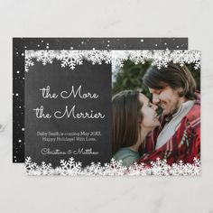 a black and white photo save the date card with snowflakes on it