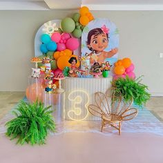 a birthday party with balloons and decorations