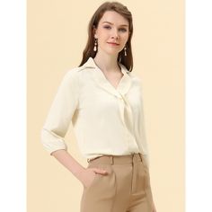 The collar flows down the front of the shirt and blends in but gives some depth. The details of the v-neck give dimension to the piece. It can be paired with slacks or a skirt and even a blazer. It's a top that you can wear to work and there are a lot of nice details so it would look nice on a zoom call. Workwear just got interesting - this updated plain blouse features an on-trend ruffle front design completed with a classic collar 3/4 sleeves. Tuck it into tailored trousers or jeans for a drin Office Tops Blouses, Drinks Outfits, Office Top, Plain Blouse, Women's Blouses, Zoom Call, Wear To Work, Work Office, Womens Clothing Sizes