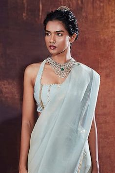 Powder blue saree with cutdana, sequin embroidered border. Paired with halter neck padded blouse. - Aza Fashions Cotton Sarees Handloom, Sanya Malhotra, Blue Saree, Jacqueline Fernandez, Banarasi Sarees, Silk Embroidery, Printed Sarees, Handloom Saree, Halter Neck