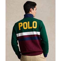 This color-blocked pullover is made with a heavyweight version of the interlock fabric that's used in Polo Ralph Lauren's Soft Cotton Polo shirts. At the left chest, it is embroidered with their signature Pony and logo..Approx. model height is 6'1' and he is wearing a size medium.Size medium has an approx. 27-1/2' body length.Mockneck.Quarter-zip placket.Long sleeves with ribbed cuffs.Kangaroo pocket with ribbed trim.Ribbed hem.Signature Pony and 'Polo' embroidered at the left chest.Body: cotton; rib: cotton, elastane.Machine wash.Imported Green Long Sleeve Sweatshirt With Contrast Color, Sporty Color Block Fleece Top, Sporty Multicolor Color Block Sweater, Sporty Cotton Sweatshirt With Color Matching, Green Fleece Half-zip Top, Multicolor Color Block Track Jacket, Multicolor Long Sleeve Color Block Track Jacket, Multicolor Color Block Long Sleeve Track Jacket, Sporty Crew Neck Sweatshirt With Color Matching