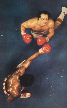 an overhead view of two men wearing boxing gloves, one with his leg in the air