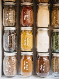 an open box filled with lots of different types of spices