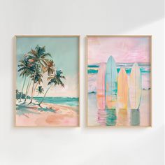 two surfboards are on the beach and one is in the water with palm trees