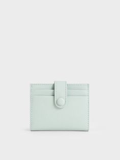 This card holder in sage green is perfect for the girl looking to add a touch of colour to her accessory collection. It features a bi-fold design that opens to reveal more card slots and inner patch pockets while the snap-button closure will ensure your items are kept securely in place. Ultra-compact, this piece can slot easily into the smallest of handbags, as well as back pockets. Belt Ring, Size Chart For Kids, Charts For Kids, Button Cards, Wallet Gifts, Charles Keith, Printables Kids, Belt Size, Sales Gifts