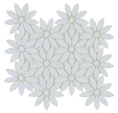 a white flower pattern is shown on the wall in front of a white background with an image of several petals