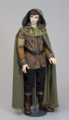 a doll is dressed in medieval clothing