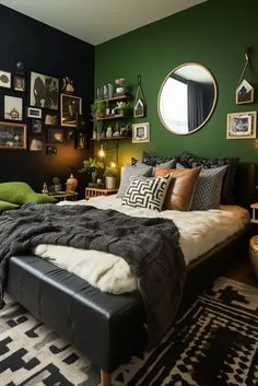 a bedroom with green walls, black and white rugs and pictures on the wall