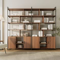 a living room with a large book shelf filled with books