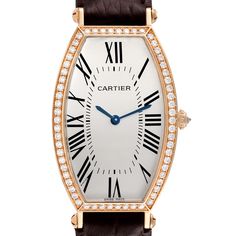 Cartier Tonneau Rose Gold Silver Dial Diamond Ladies Watch 2849. Manual winding movement. 18K rose gold tonneau case 46.6 mm x 26.5 mm. Circular grained crown set with an original Cartier factory diamond. 18K rose gold bezel set with original Cartier factory diamonds. Scratch resistant sapphire crystal. Silver dial with black Roman numerals. Sword shaped blued steel hands. Brown leather strap with 18K rose gold deployant buckle. Classic Rose Gold Diamond Watch, Oval Quartz Watch For Formal Occasions, Rose Gold Diamond Watch With Rectangular Dial For Anniversary, Rose Gold Diamond Watch For Anniversary With Rectangular Dial, Formal Rose Gold Diamond Watch With Rectangular Dial, Classic Oval Diamond Watch For Formal Occasions, Timeless Oval Diamond Watch, Formal Oval Diamond Watch With Diamond Hour Markers, Timeless Oval Diamond Watch For Formal Occasions