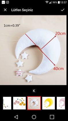 an image of the moon and stars in different sizes on a cell phone with measurements