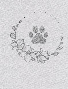 a dog's paw with flowers and leaves around it