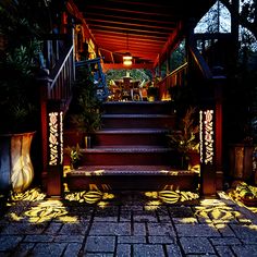 an outdoor area with steps and plants