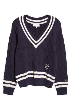 Team colors and an embroidered logo show your love for the Yankees in the cable-knit sweater framed with sporty striped rib trim. 22" length (size Medium) V-neck Long sleeves Ribbed cuffs and hem 100% cotton Hand wash, dry flat Imported Asian & Pacific Islander Owned/Founded Ralph Lauren V Neck Sweater, Pacific Islander, Merch Ideas, Sporty And Rich, Cable Knit Sweater, Team Colors, Wool Sweaters, Vneck Sweater, Cable Knit