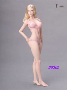 a barbie doll is posed in a pink bra and panty for the photo shoot