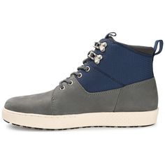 The Wasatch sneaker boot from Territory is certain to become your new go-to. Genuine leather materials with two-tone embellishments shape this high-top design, which is supported by a flexible yet durable EVA/rubber hybrid outsole. A lace-up fastening ensures a secure fit, while an 8 mm Tru Comfort Foam™ insole with a padded collar provides superior support. Laced High-top Sneakers For Hiking, Leather Lace-up High-top Sneakers For Outdoors, Blue High-top Hiking Sneakers, Blue Hiking Sneakers, Synthetic High-top Lace-up Sneakers For Walking, Urban High-top Waterproof Boots With Rubber Sole, Synthetic Lace-up High-top Sneakers For Walking, Urban Style Lace-up Hiking Boots With Rubber Sole, High-top Studded Boots For Outdoor Activities