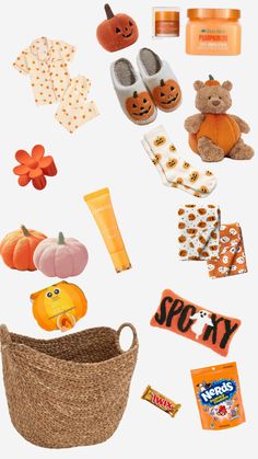 an assortment of halloween items are arranged in the shape of a basket