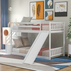 there is a bunk bed with a slide on the bottom and stairs to the top