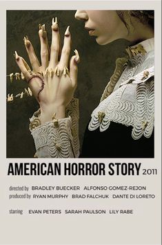 an advertisement for the american horror story 2011, featuring two hands with nails on them