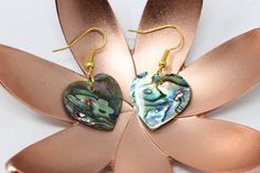 "These dangle/ drop earrings are hand carved from abalone shell. They hang from a gold color metal hook for regular pierced ears. **Each one is carved by hand and finished products will have variance. Dimensions are approximate: 1 Round: .75\" 2 Heart: 1\" x .75\" Ships form Orlando, Fl" Abalone Earrings, Mandala Necklace, Earrings Heart, Earrings Round, Round Circle, Shell Jewelry, Metal Hooks, Abalone Shell, Shell Earrings