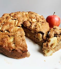 an apple pie is cut in half and ready to be eaten