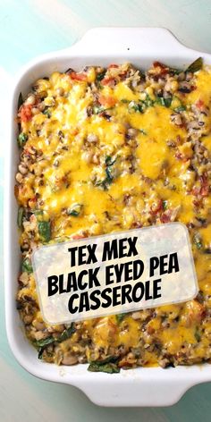 a white casserole dish filled with black eyed pea and tex mex cheese