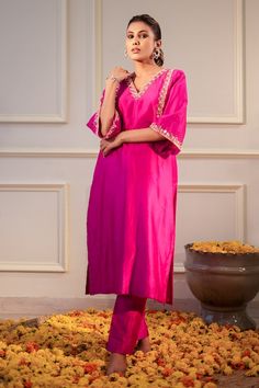 Hot pink kurta featuring mirror hand embroidery and a v-neckline. Paired with a pant. - Aza Fashions V-neck Traditional Wear For Eid, V-neck Sets With Resham Embroidery For Festive Season, Diwali Resham Embroidery V-neck Sets, Festive V-neck Sets With Resham Embroidery, V-neck Kurta With Dabka Work For Party, V-neck Chanderi Sets For Diwali, Diwali Dabka Work V-neck Sets, V-neck Kurta With Resham Embroidery For Festive Occasions, V-neck Palazzo Set With Zari Work For Eid