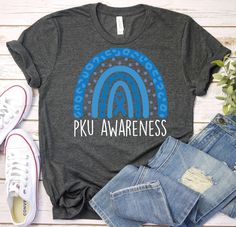 PKU Awareness Shirt, Phenylketonuria Awareness Shirt, PKU Shirt,PKU Warrior Shirt,Pku Survivor Shirt,Pku Blue Raibow Shirt,Pku Support Shirt ------------------------------------------------------- A B O U T - T H I S - T S H I R T ------------------------------------------------------- PKU Awareness Shirt, Phenylketonuria Awareness Shirt, PKU Shirt,PKU Warrior Shirt,Pku Survivor Shirt,Pku Blue Raibow Shirt,Pku Support Shirt(F24-442) Available in size : XS, S, M, L, XL, 2XL, 3XL Available in colo Als Awareness, Occupational Therapy Shirts, Education Shirts, Counselor Gifts, Kindergarten Teacher Shirts, Teachers Aide, Warriors Shirt, Ribbon Shirt, Rainbow Shirt