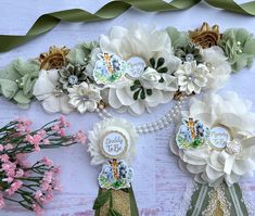 some flowers and ribbons on a table