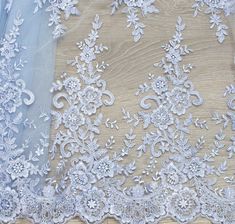 Blue Guipure - Floral fabric - Wedding guipure - Lace embroidery fabric flowers - blue guipure lace fabric - Wedding Fabric Unique guipure lace fabric Price for length 1 meter = 39.4 in = 59$ Color: Ivory, Mint, Pink, Black, White Width: 53 in = 1,35 m Material: 100% Nylon / 100% Polyester So, if you buy 1 meter (39,4 in) you take piece 1 m * 1,35 m. We cut the required length into one piece. Please, pay attention to the photos. Notes: limited quantity. *Shipping company: Ukrpochta, DHL Express Blue Tulle Fabric For Wedding, Blue Embroidered Lace Fabric For Wedding, Blue Embroidered Wedding Fabric With Lace Work, Blue Embroidered Fabric With Lace Work For Wedding, Blue Embroidered Lace Work Fabric For Wedding, Blue Lace With Lace Trim For Wedding, Blue Lace For Wedding, Blue Lace Patchwork For Wedding, Peach Lace