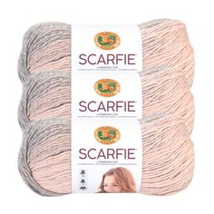 two skeins of yarn with the words scarfi on them in red and grey