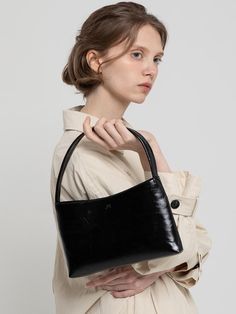 Composition : MAIN : POLYURETHANE 100% SUB : POLYESTER 100%Color : BlackCountry of Origin : China Sleek Black Baguette Bag, Sleek Black Baguette Bag For Daily Use, Black Structured Shoulder Bag, Sleek Black Baguette Bag With Removable Pouch, Black Tote Bag, Womens Tote Bags, Composition, China, Tote Bag