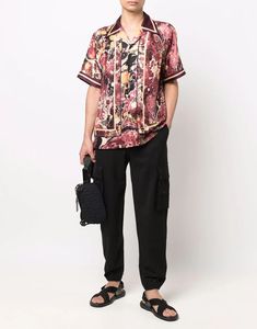 This silk shirt showcases Dolce & Gabbana's unique blend of bold Sicilian design and fluid silhouette. Adorned with an all-over graphic print contrasting border, short-sleeve exudes the brand's vibrant style. Made from luxurious silk, it brings a touch luxury to any wardrobe. Vibrant Style, Short Loungewear, Printed Silk Shirt, Bold Design, Suits Coats, T-shirt Polos, Silk Shirt, Shirt Sale, Silk Ties