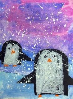 two penguins are standing in the snow and one penguin is looking up at the sky