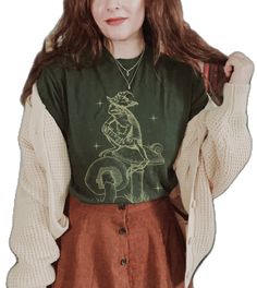 Fall Fairy Grunge Cotton Tops, Fairy Grunge Cotton Tops For Fall, Green Cotton Goblincore Top, Green Goblincore Cotton Top, Grunge Green Tops For Fall, Fall Goblincore Crew Neck T-shirt, Fairy Grunge Long Sleeve T-shirt For Fall, Dark Academia Cotton Top For Fall, Goblincore Crew Neck T-shirt For Fall