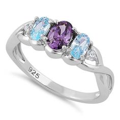 Top of ring height: 8mm
Top of ring width: 11mm
Band width: 4mm
Shank width: 1.8mm
Stone material: aqua blue & purple cubic zirconia
Center stone size: 6mm x 4mm
Stone shape: oval (center) & round
Center stone carat weight: 0.4 ct.
Total number of CZ stones: 5
Stone setting: Prong setting
Metal: 925 sterling silver
Plating: rhodium plated
Finish: high polish Multi Gem Ring, Multi Gemstone Ring, Stamped Rings, Aqua Marine, Cubic Zirconia Rings, Cz Ring, Cz Stone, Wedding Ring Sets, Stone Settings