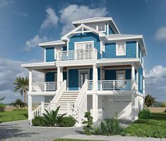 a blue and white two story house with balconies on the second floor is shown