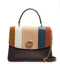 Mixed-texture color-blocked stripes energize a structured handbag secured by a signature logo turnlock at the flap. The structured silhouette means it won't topple over or puddle when you set it down, and a neat top handle and optional chain-and-leather crossbody strap offer convenient carrying options. Turnlock flap closure Top handle; removable chain-and-leather crossbody strap Exterior slip pocket Interior zip, wall and smartphone pockets Leather 7 1/2”W x 7”H x 4 1/2”D. (Interior capacity: s Coach Parker, Oxblood Leather, Coach 1941, Leather Satchel Bag, Coach Leather, Satchel Handbags, Leather Satchel, Leather Top, Satchel Bags