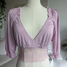 Urban Outfitters Lavender Samara Crop Top. Size Small. New With Tags. Feminine Lavender V-neck Top, Lavender Fitted V-neck Tops, Spring Lavender V-neck Top, Spring Purple Tops For Loungewear, Fitted Purple Top For Brunch, Lavender Tops For Spring Brunch, Lavender Spring Tops For Brunch, Fitted Mauve V-neck Top, Elegant Lavender Tops For Spring