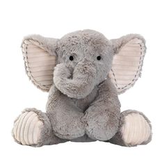 an elephant stuffed animal sitting on top of a white surface with its trunk up and eyes closed